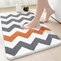 Absorbent plush bathroom mat featuring grey and orange chevron patterns with soft texture - 40*60cm / Wave of Light-Orange