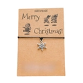 Detail of Christmas snowflake pendant wish bracelet on a Kraft paper display card - Snowflake 1