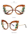 Modische Cat-Eye-Brille in Schildpatt-Optik mit Strasssteinen und Blattgold-Dekor - Schildpatt-Rahmen mit klarem Glas