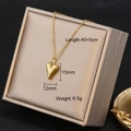 Detail view of gold heart necklace pendant with dimensions 15mm by 12mm and 45cm chain - 7168-7/Small Heart