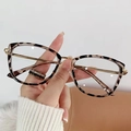 Occhiali cat-eye con montatura leopardata tartarugata e aste sottili in metallo oro - Fotocromatico / Tartarugato Oro