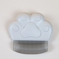 Cepillo gris claro para mascotas con forma de pata de gato y púas de acero inoxidable - Forma de Garra / Gris