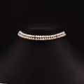 Double-layer freshwater pearl choker necklace with a silver metallic clasp on a black bust - Double Layer Pearl Necklace