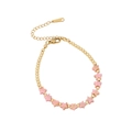 Handmade beaded star bracelet featuring pink pentagram beads and gold-plated round beads - Pink Imperial Stone