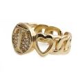 Detail shot of the golden open ring featuring a T-letter and heart watchband design - Letter T