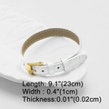 Detailed view of white faux leather strap with golden buckle and dimensional annotations - White Leather Band