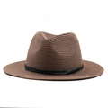 Close-up of woven paper straw texture and black faux leather band on a brown Fedora sun hat - M (56-58cm) / Brown