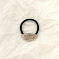 Elastic black hair tie with irregular textured silver oval metal ornament detail - Silver Oval 4cm