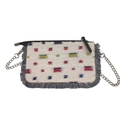 Light blue denim crossbody bag with colorful patches and distressed fringe details - White Checkerboard