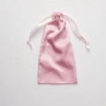 Pink silk satin drawstring storage bag for eye masks and accessories on white background - No.4 Pink
