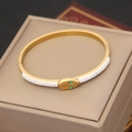 Bracciale a serpente in acciaio dorato con cristalli luminosi e dettagli in pietra verde - Design Testa di Serpente (4#)