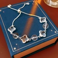 Bracciale regolabile in argento con ciondolo a quadrifoglio in cristallo e perline - Bracciale con Fibbia a Tirare Quadrifoglio (68#) / Argento-Bianco