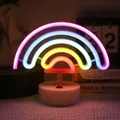 Rainbow LED neon night light with white circular base and dual USB battery power - Rainbow