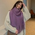 Soft purple pashmina scarf with tassels shown on a model for a stylish winter look - Deep purple
