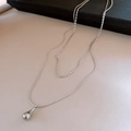 Minimalist silver-toned double-layered necklace featuring a polished water drop pendant - Silver