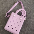 Versatile lilac silicone handbag with classic perforated design and woven shoulder strap - Light Purple