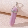 Amethyst hexagonal pillar stone pendant with silver metal bail on pink background - Luminous Purple