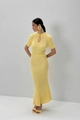 Detail of light yellow knit dress featuring a vertical ribbed texture and tie-neckline - S / Yellow