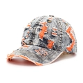 Detailed macro of distressed washed denim baseball cap with orange layered rip details - One Size / Wash Blue with Orange Distressed Detail (F)