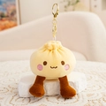 Porte-clés peluche petit pain avec visage souriant et jambes brunes sur mousqueton - Jaune