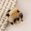 Elegant small tortoiseshell cellulose acetate hair claw clip on beige fabric - Mini Hair Claw / Light Tortoise Shell
