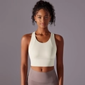 Close-up of wide shoulder straps and cream sports bra fabric for high elasticity support - Light Ivory