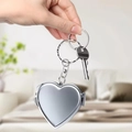 Portachiavi in metallo argentato a forma di cuore con doppi anelli e piccola chiave - Forma di Cuore