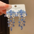 Macro shot of blue crystal drop earrings with S925 silver needles and layered tassels - Style 18# Silver Earring Post-Blue-Waterdrop