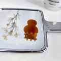 Mini acetate hair claw clip in amber brown on mirror background for girls - Light Coffee