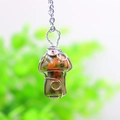 Macro shot of handmade silver wire wrapped green stone mushroom pendant necklace - Unakite Silver-tone