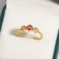 Elegant gold ring with square red gemstone and pink zircon flower details in a jewelry box - Square Red Main Stone Pavé Diamond Flower Style (金色31)