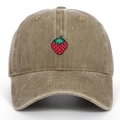 Detailed close-up of high-quality red strawberry embroidery on washed khaki cotton cap - Adjustable / Khaki