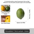 Artificial lemon models in green and yellow with realistic skin texture and stems - 7.5cm Green Lemon