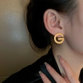 Minimalist gold G-letter stud earring with polished metallic finish on woman - Alphabet G Shaped Ear Stud (17# Silver Earring Post-Gold)