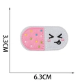 Pillenförmiger Aufnäher mit süßem Emoji und Größenangaben von 6,3 cm x 3,3 cm - Nr.2 (Kapsel)