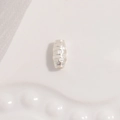 Macro detail of S925 sterling silver barrel bead featuring a geometric brick texture finish - Large Square Pattern / 3x6mm / Silver