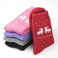Thick winter crew socks featuring festive reindeer patterns in assorted colors - One Size / Christmas Deer Mix