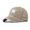 Détail de la casquette vintage 1974 délavée avec maille respirante et bordure usée - Kaki