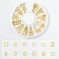 Golden alloy nail art charms set with various shapes in a white storage wheel - 3D Hollow Series (XY-11)
