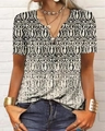Détail d'un t-shirt à manches longues pour femmes avec col en V et motif géométrique - S / Hauts / Motif 4-Manches courtes