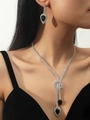 Detail of silver bow necklace with black teardrop crystals worn by a model - Black Waterdrop Silver Set(DTN14027014BK)