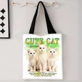 Detail of white canvas tote bag with cute cat digital print and black woven handle - Three Kittens Cute Cat Quotes(jiayingstd57)