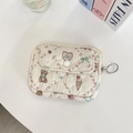 Detailed view of quilted cream pouch with cute bear floral print and key ring - Lace Pastry