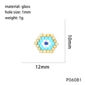 Detailed view of hexagonal evil eye glass bead with 12mm size and 1mm hole measurement - P06081 Dark Blue White Gold