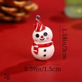 Detail view of resin snowman pendant with dimensions 1.18in height and 2g weight - Red Hat Christmas Snowman