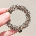 Elastic champagne gray crystal bead hair tie with elegant black metal logo pendant - Gray Black Crystal