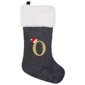 Detail of grey velvet Christmas stocking featuring embroidered gold letter O and mini santa hat - Letter O