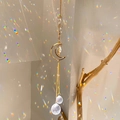 Golden sun and moon suncatcher with clear crystal ball reflecting rainbows - B27 Style
