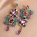 Close-up of colorful crystal flower earrings on champagne silk background - Purple Flower (Style HE8797)