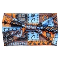 African print wide elastic headband with orange and blue tribal pattern and center knot - Style 95